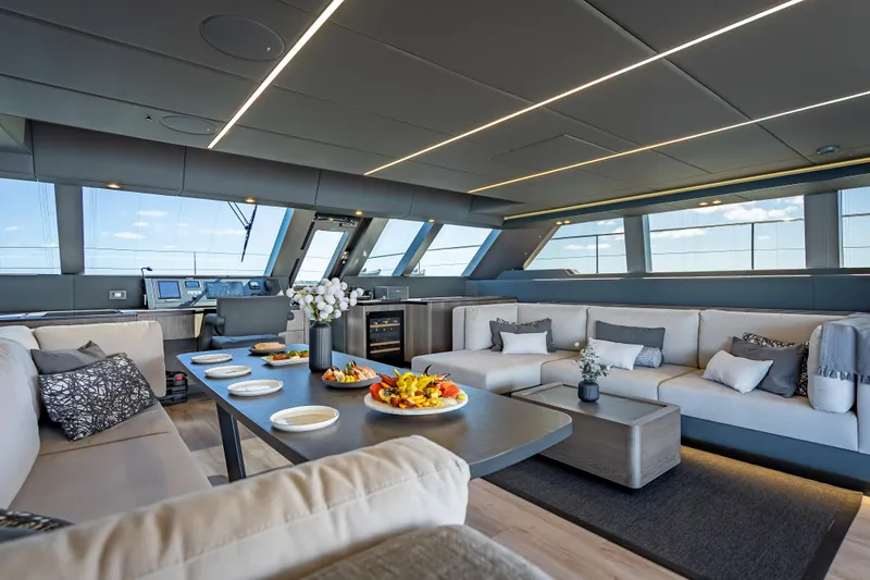 Slide: The Image of Luxurious interior of 2026 Sunreef 60 Power yacht with elegant seating and dining area. - 44