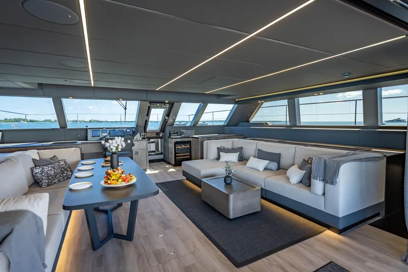Slide: The Image of Luxurious interior of 2026 Sunreef 60 Power yacht with elegant seating and dining area. - 45