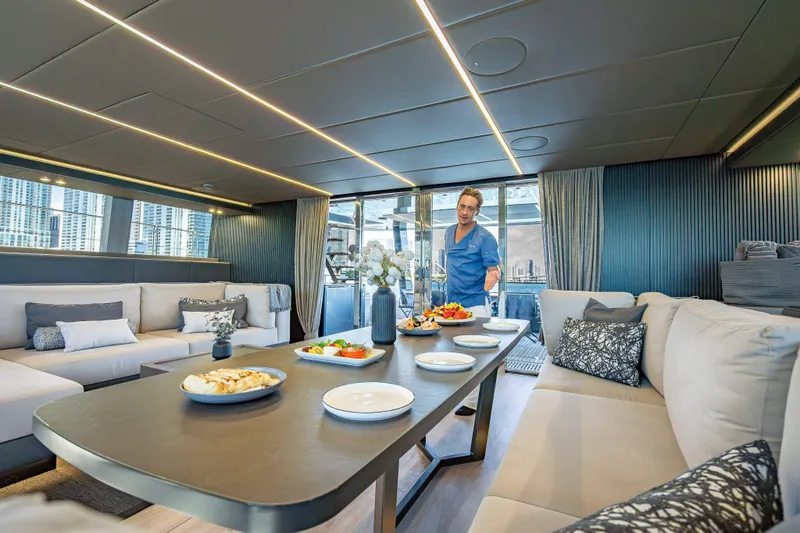 Slide: The Image of Luxurious interior of 2026 Sunreef 60 Power yacht with elegant dining setup. - 48