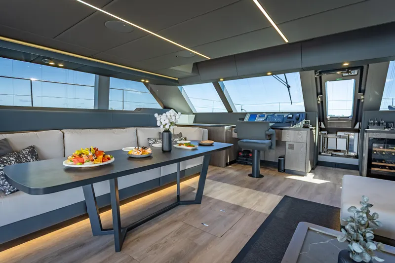 Slide: The Image of Luxurious interior of 2026 Sunreef 60 Power yacht with elegant dining area and modern helm. - 53