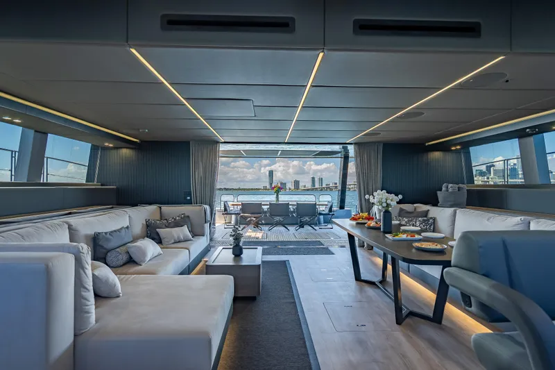 Slide: The Image of Luxurious interior of 2026 Sunreef 60 Power yacht with elegant seating and dining area. - 54