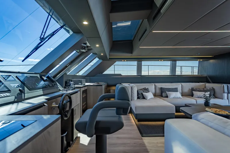 Slide: The Image of Luxurious interior of 2026 Sunreef 60 Power yacht with modern seating and panoramic windows. - 59