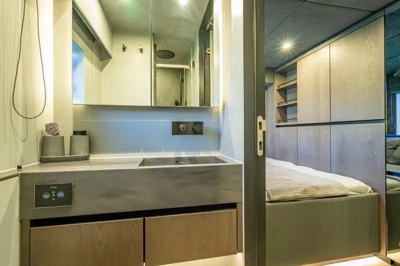 Slide: The Image of Luxurious interior of 2026 Sunreef 60 Power yacht featuring modern bathroom and bedroom. - 66