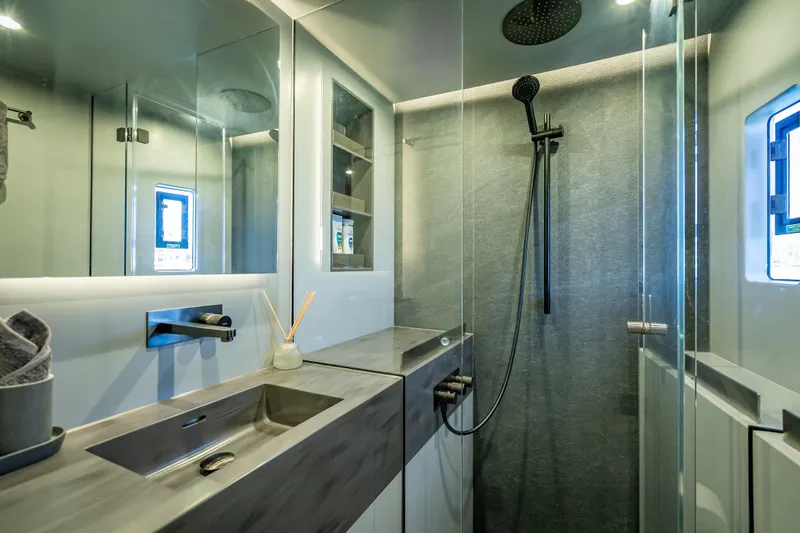 Slide: The Image of Luxurious bathroom in 2026 Sunreef 60 Power yacht with modern fixtures and sleek design. - 69