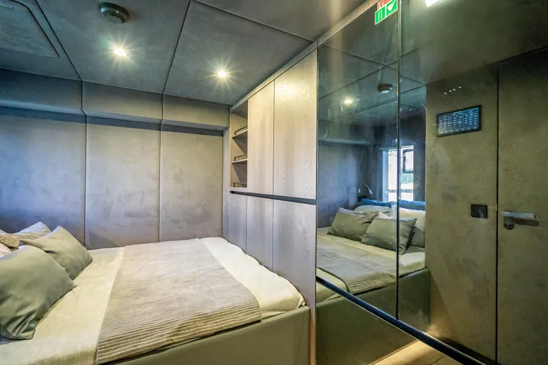 Slide: The Image of Luxurious bedroom interior of 2026 Sunreef 60 Power yacht with modern design and ambient lighting. - 72