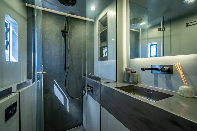 Slide: The Image of Luxurious bathroom in 2026 Sunreef 60 Power yacht with modern fixtures and sleek design. - 73