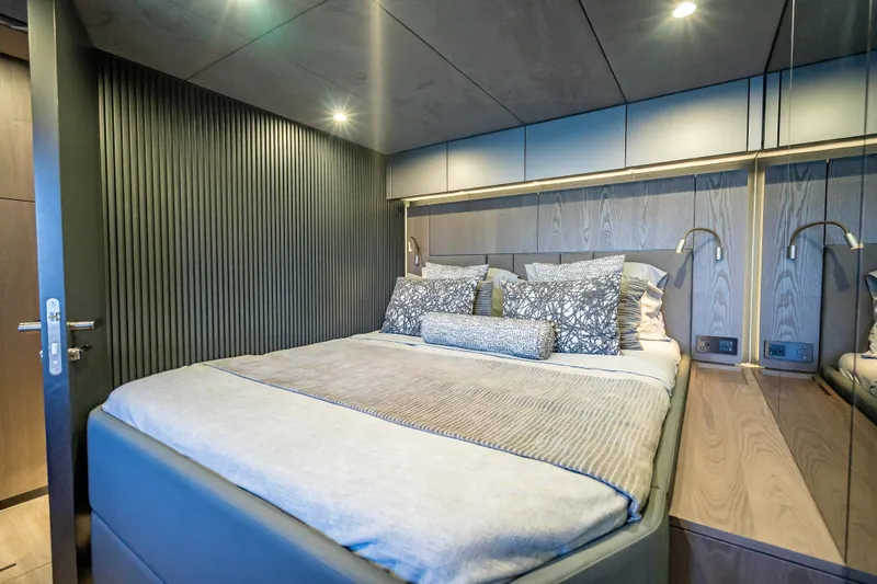 Slide: The Image of Luxurious bedroom interior on 2026 Sunreef 60 Power yacht, featuring modern design and elegant bedding. - 75