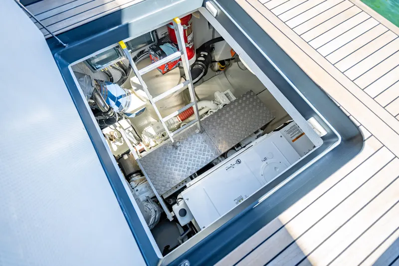 Slide: The Image of Engine room of 2026 Sunreef 60 Power yacht with visible machinery and equipment. - 82