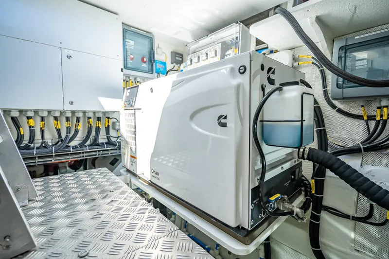 Slide: The Image of Engine room of 2026 Sunreef 60 Power yacht with Cummins generator and wiring. - 83