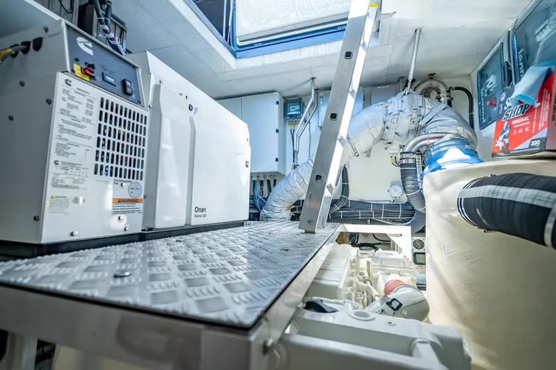 Slide: The Image of Engine room of 2026 Sunreef 60 Power yacht with Onan generator and equipment. - 90