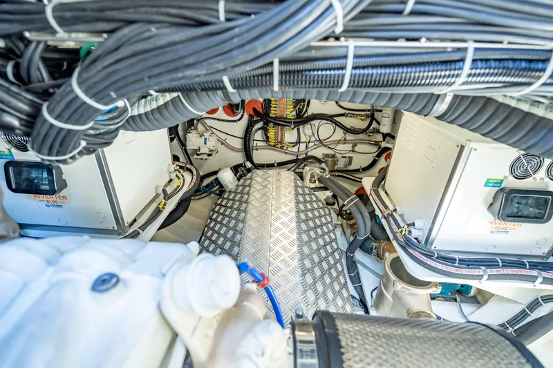Slide: The Image of Engine room of 2026 Sunreef 60 Power yacht, showcasing wiring and machinery. - 91