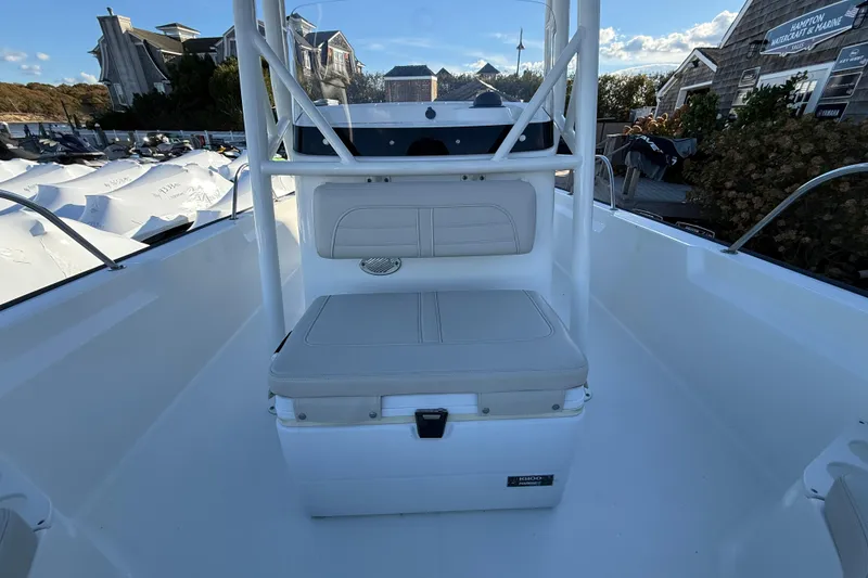 Slide: The Image of 2021 Boston Whaler 190 Montauk boat interior with seating and storage. - 20