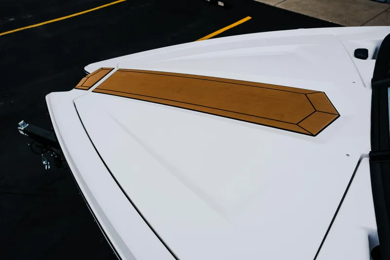 Slide: The Image of 2026 MasterCraft ProStar 190 boat deck with sleek design and wood accent. - 14