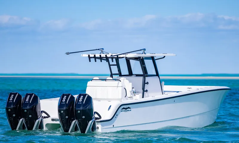 Slide: The Image of 2025 Invincible 35 Catamaran with triple outboard engines on open water. - 37