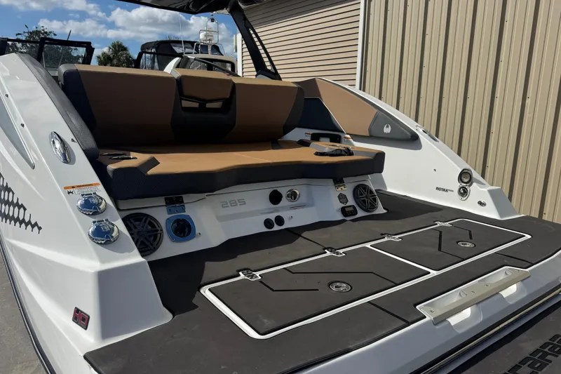 Slide: The Image of 2022 Scarab 285 ID boat with sleek seating and modern design features. - 15