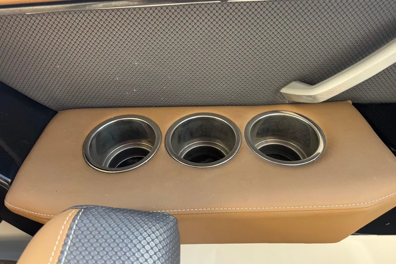 Slide: The Image of 2022 Scarab 285 ID interior with three stainless steel cup holders. - 34
