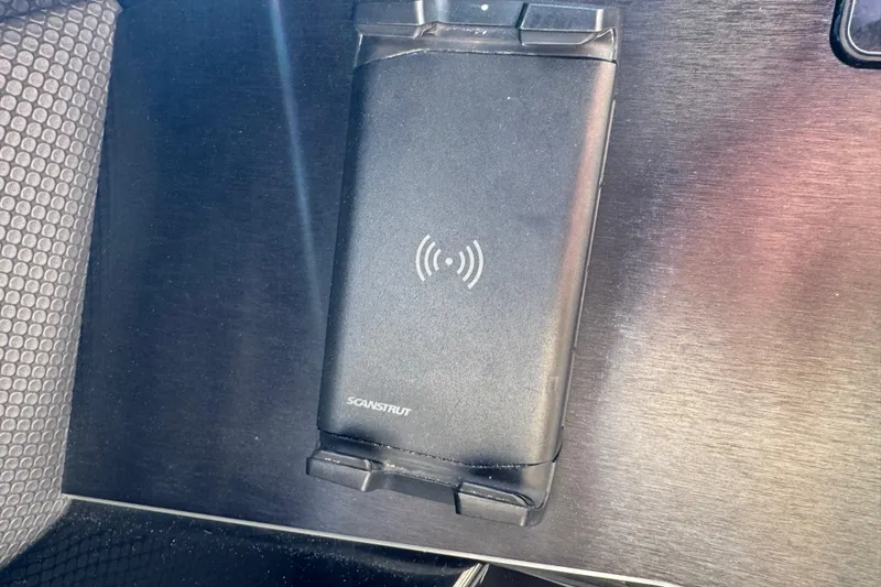 Slide: The Image of Wireless charging pad in 2022 Scarab 285 ID boat interior. - 35