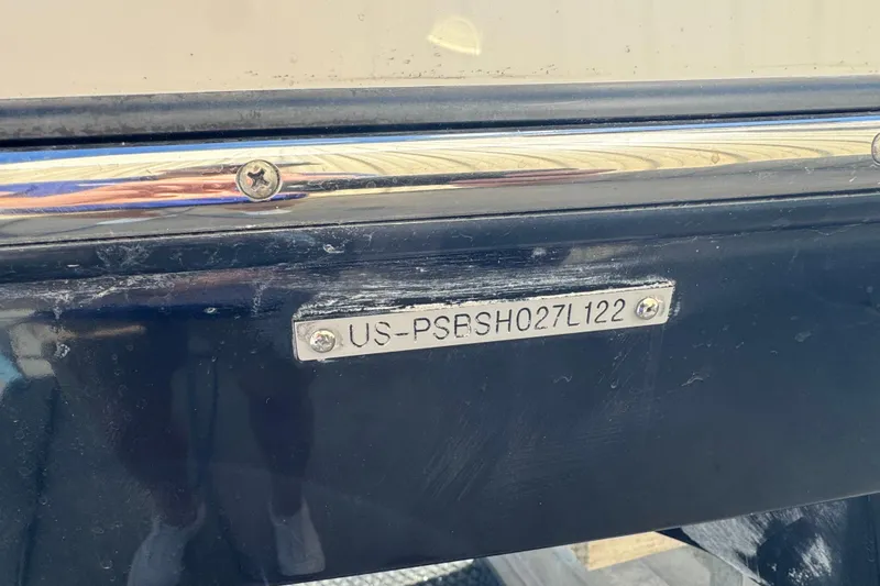 Slide: The Image of 2022 Scarab 285 ID boat with visible hull identification number plate. - 8