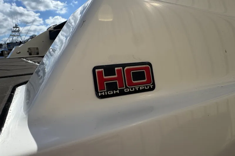 Slide: The Image of 2022 Scarab 285 ID boat with "High Output" badge on white hull. - 9