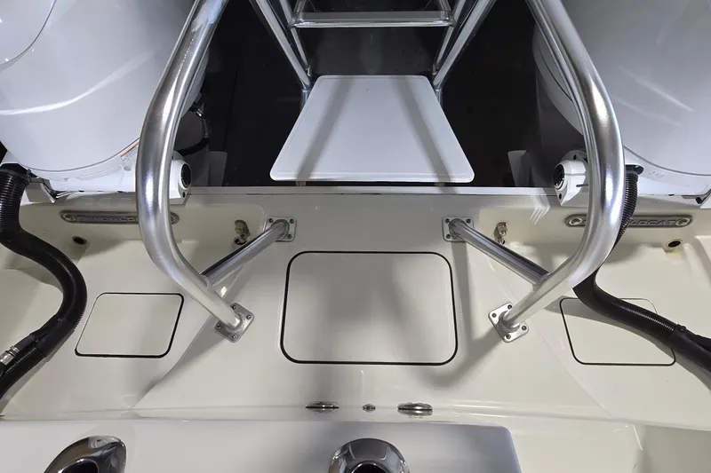 Slide: The Image of 2024 WorldCat 280 CC-X boat deck with stainless steel railings and engine components. - 30