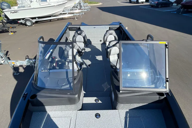 Slide: The Image of 2026 Crestliner 2050 Authority boat interior with dual consoles and seating. - 22