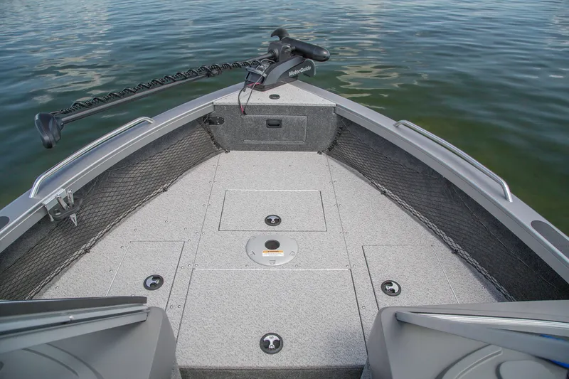 Slide: The Image of Manufacturer Provided Image: 2025 Crestliner 2050 Authority boat deck with trolling motor on calm water. - 25