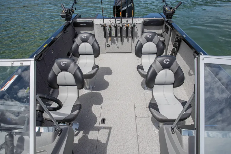 Slide: The Image of Manufacturer Provided Image: 2025 Crestliner 2050 Authority boat interior with seating and fishing rod holders. - 29