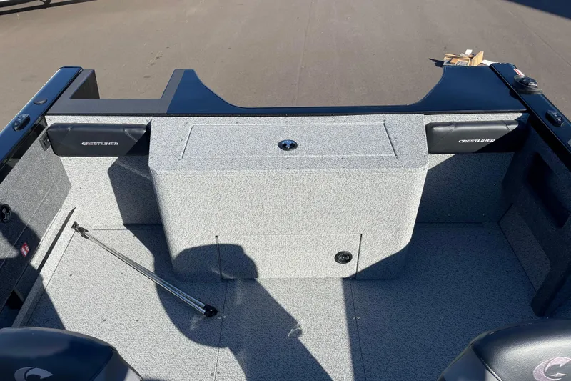 Slide: The Image of 2026 Crestliner 2050 Authority boat interior with storage compartments and seating. - 3