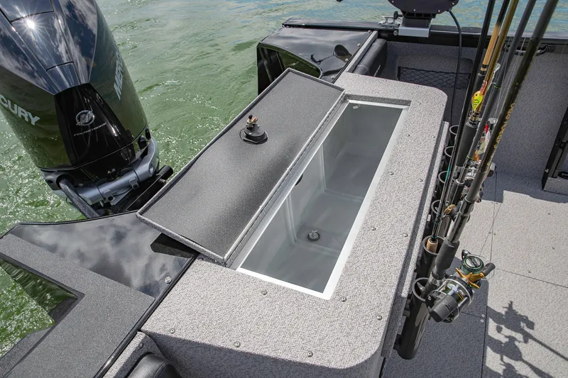 Slide: The Image of Manufacturer Provided Image: Crestliner 2050 Authority 2025 fishing boat with open storage compartment and fishing rods. - 32