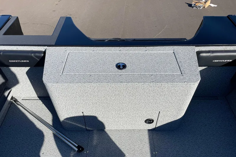 Slide: The Image of 2026 Crestliner 2050 Authority boat interior with storage compartment and sleek design. - 4