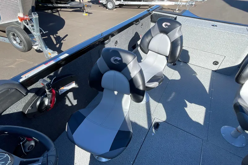 Slide: The Image of 2026 Crestliner 2050 Authority boat interior with sleek seating and modern controls. - 9