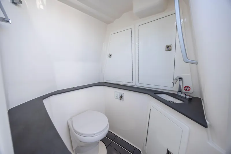 Slide: The Image of 2023 Aviara AV32 OB boat bathroom with modern fixtures and sleek design. - 31