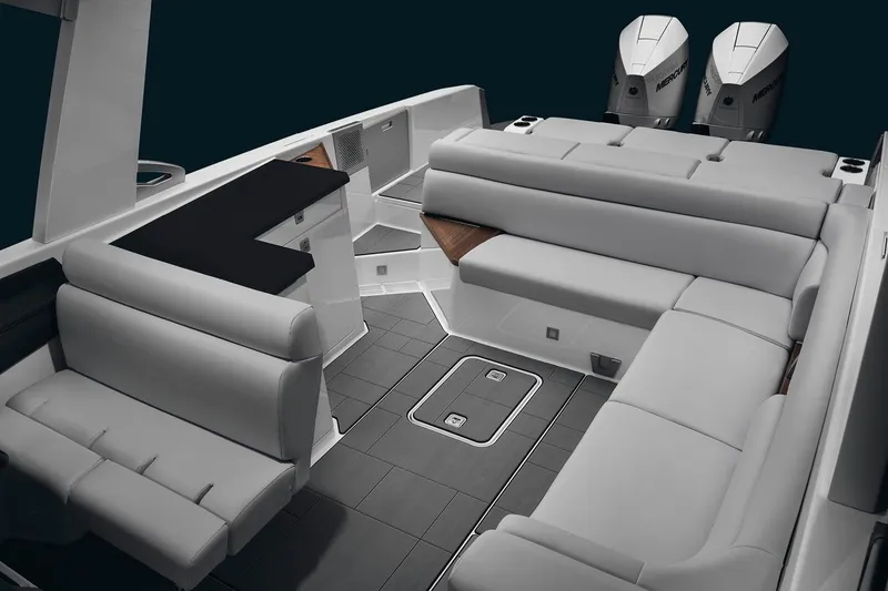 Slide: The Image of 2023 Aviara AV32 OB boat with dual Mercury outboard engines on water. - 9