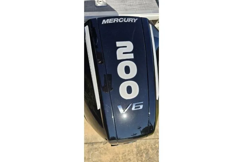 Slide: The Image of Mercury 200 V6 outboard motor on Sun Tracker Party Barge 22 RF XP3, 2026 model. - 10