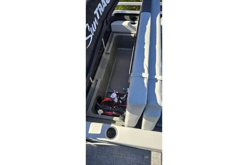 Slide: The Image of Open storage compartment in 2026 Sun Tracker Party Barge 22 RF XP3 pontoon boat. - 11