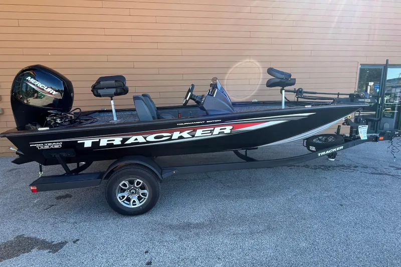 The Image of 2026 Tracker Pro Team 195 boat with Mercury engine, parked on a trailer. - 0