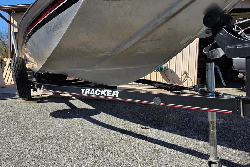 Slide: The Image of 2010 Bass Tracker Pro Crappie 175 boat on trailer, parked outdoors. - 16