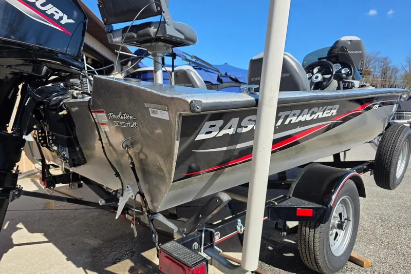 Slide: The Image of 2010 Bass Tracker Pro Crappie 175 boat on trailer, featuring Mercury outboard motor. - 3