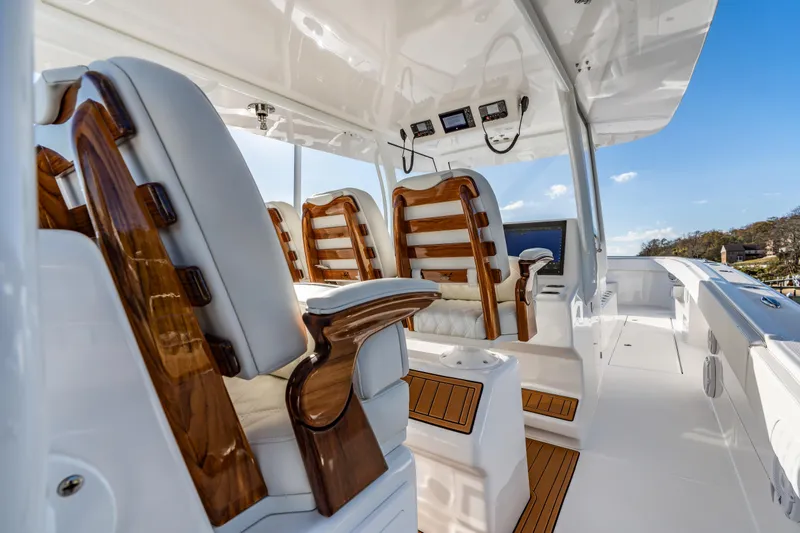 Slide: The Image of Luxurious interior of 2025 Front Runner 43 Catamaran with elegant seating and modern controls. - 10