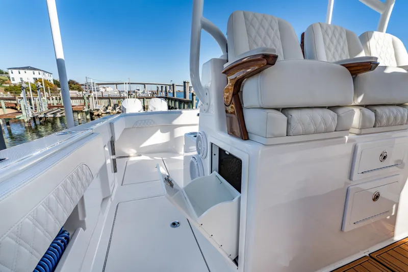 Slide: The Image of Luxurious seating on 2025 Front Runner 43 Catamaran, docked at marina. - 34