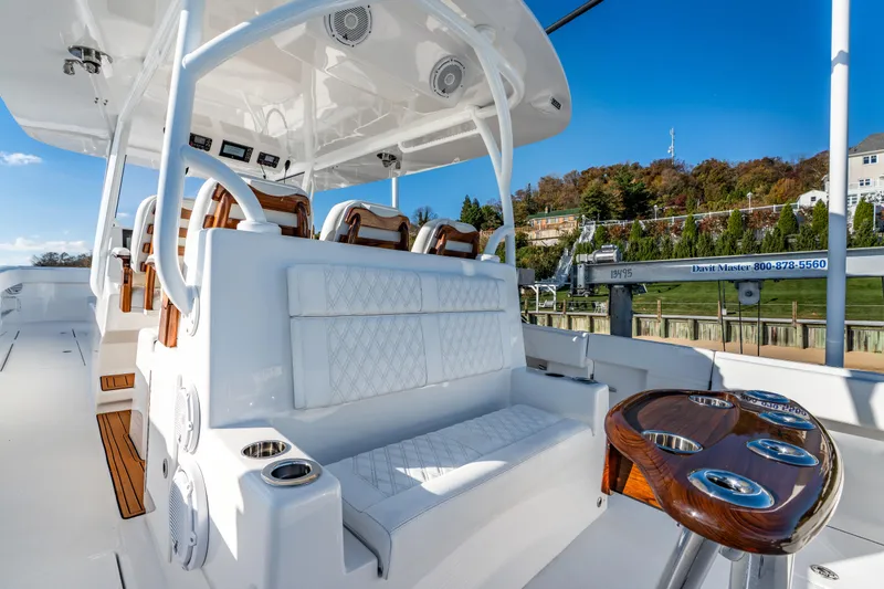 Slide: The Image of Luxurious 2025 Front Runner 43 Catamaran with elegant seating and sleek design. - 8