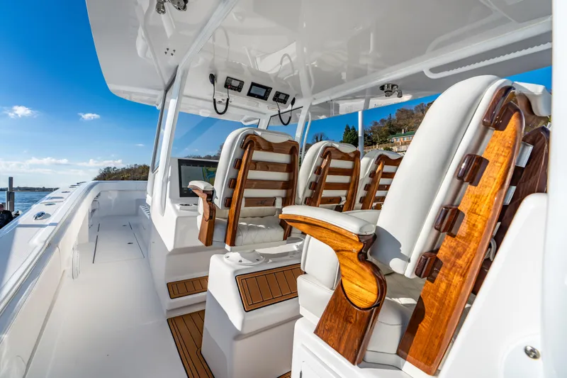 Slide: The Image of Luxurious interior of 2025 Front Runner 43 Catamaran with elegant seating and modern controls. - 9