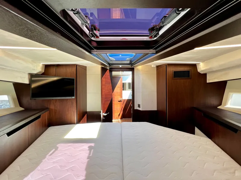Slide: The Image of Interior of 2021 Galeon 425 HTS yacht with bed and skylight. - 18
