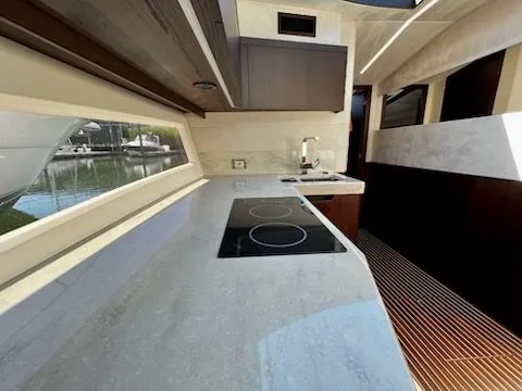 Slide: The Image of Interior of Galeon 425 HTS yacht kitchen, year 2021. - 9