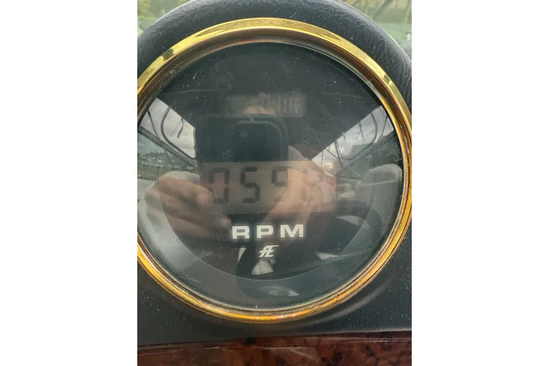 Slide: The Image of Close-up of RPM gauge on 2005 Carver 466 Motor Yacht dashboard. - 11