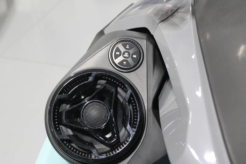 Slide: The Image of 2023 Sea-Doo Wake Pro 230 speaker and control panel close-up. - 13