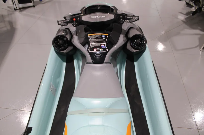 Slide: The Image of 2023 Sea-Doo Wake Pro 230 jet ski cockpit with controls and seating. - 4