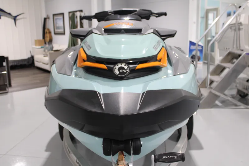 Slide: The Image of 2023 Sea-Doo Wake Pro 230 jet ski in showroom, front view. - 5