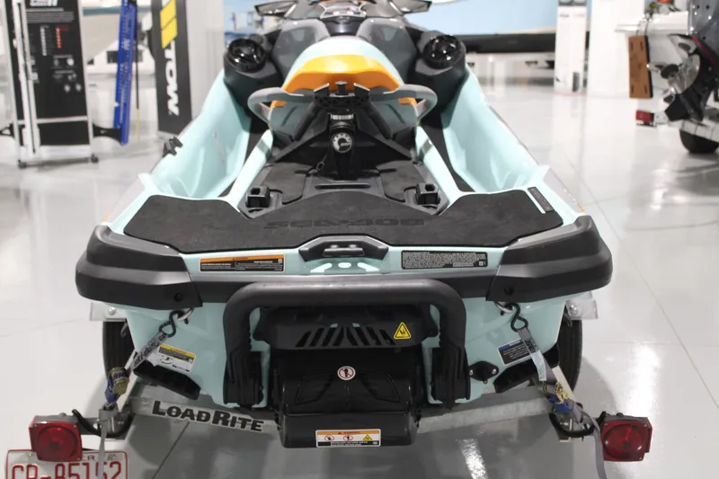 Slide: The Image of 2023 Sea-Doo Wake Pro 230 on trailer in showroom, rear view. - 7