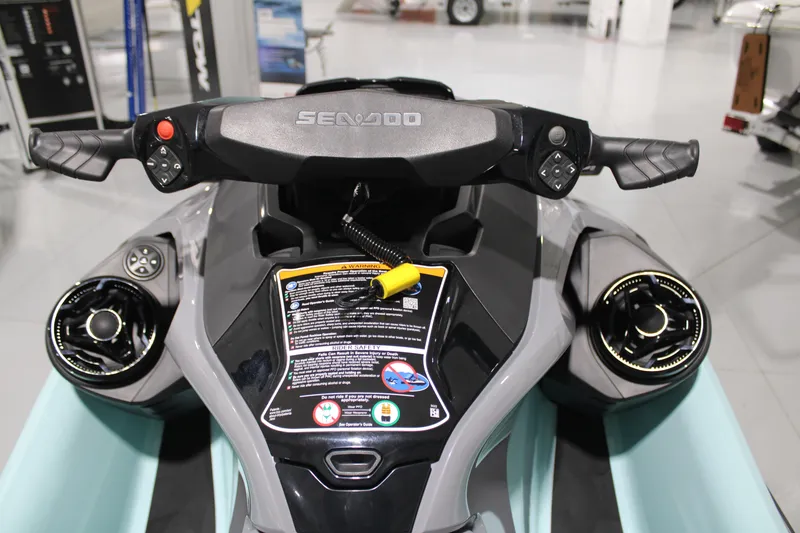 Slide: The Image of 2023 Sea-Doo Wake Pro 230 dashboard with handlebars and control panel. - 8